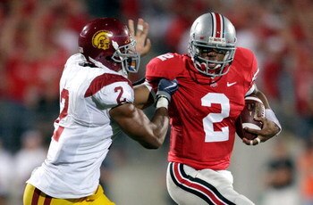 COLUMBUS, OH - SEPTEMBER 12:  Terrelle Pryor #2 of the Ohio State Buckeyes runs with the ball while defended by Taylor Mays #2 of the USC Trojans at Ohio Stadium on September 12, 2009 in Columbus, Ohio.  (Photo by Andy Lyons/Getty Images)