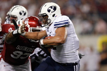 ARLINGTON, TX - SEPTEMBER 05: Running back Manase Tonga #11 of the Brigham Young Cougars at Cowboys Stadium on September 5, 2009 in Arlington, Texas. (Photo by Ronald Martinez/Getty Images)