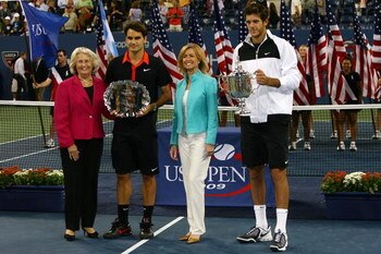 NEW YORK - SEPTEMBER 14:  (L-R) USTA president Lucy S. Garvin, Roger Federer of Switzerland and Juan Martin Del Potro of Argentina pose with the trophies after the Men's Singles final on day fifteen of the 2009 U.S. Open at the USTA Billie Jean King Natio