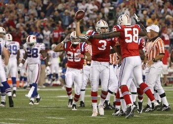 FOXBORO, MA - SEPTEMBER 14:  Kicker Stephen Gostkowski #3 of the New England Patriots celebrates with teammates after he recovered a fumble against the Buffalo Bills in the fourth quarter at Gillette Stadium on September 14, 2009 in Foxboro, Massachusetts