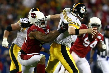 TAMPA, FL - FEBRUARY 01:  Darnell Dockett #90 of the Arizona Cardinals sacks quarterback Ben Roethlisberger #7 of the Pittsburgh Steelers during the fourth quarter of Super Bowl XLIII on February 1, 2009 at Raymond James Stadium in Tampa, Florida.  (Photo