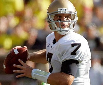 ANN ARBOR, MI - SEPTEMBER 12:  Quarterback Jimmy Clausen #7 of Notre Dame drops back to pass against Michigan at Michigan Stadium on September 12, 2009 in Ann Arbor, Michigan.  (Photo by Domenic Centofanti/Getty Images)