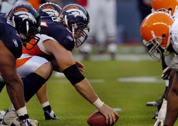 DENVER - AUGUST 25: Center Tom Nalen #66  of the Denver Broncos gets set to snap the ball during the pre-season football game against the Cleveland Browns on August 25, 2006 at Invesco Field at Mile High in Denver, Colorado.   (Photo by Steve Dykes/Getty 