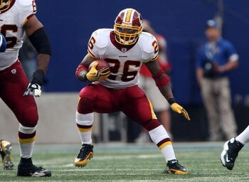 EAST RUTHERFORD, NJ - SEPTEMBER 13:  Clinton Portis #26 of the Washington Redskins runs the ball against the New York Giants on September 13, 2009 at Giants Stadium in East Rutherford, New Jersey.  (Photo by Jim McIsaac/Getty Images)