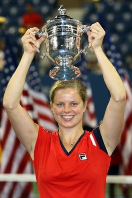 NEW YORK - SEPTEMBER 13:  Kim Clijsters of Belgium holds up the championship trophy after defeating Caroline Wozniacki of Denmark in the Women�s Singles final on day fourteen of the 2009 U.S. Open at the USTA Billie Jean King National Tennis Center on Sep