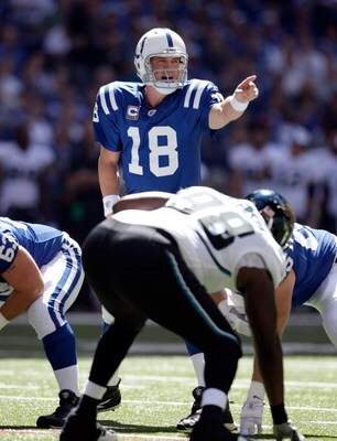 INDIANAPOLIS - SEPTEMBER 13:  Peyton Manning #18 of the Indianapolis Colts gives instructions to his team during the game against the Jacksonville Jaguars at Lucas Oil Stadium on September 13, 2009 in Indianapolis, Indiana.  (Photo by Andy Lyons/Getty Ima