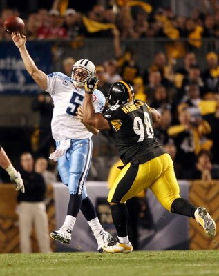 PITTSBURGH - SEPTEMBER 11:  Casey Hampton #98 of the Pittsburgh Steelers pressures Kerry Collins #5 of the Tennessee Titans on September 11, 2009 at Heinz Field in Pittsburgh, Pennsylvania. The Steelers defeated the Titans 13-10 in overtime.  (Photo by El