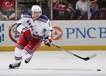 NEWARK, NJ - SEPTEMBER 16: Enver Lisin #81 of the New York Rangers skates against the New Jersey Devils at the Prudential Center on September 16, 2009 in Newark, New Jersey. The Devils defeated the Rangers 3-2 in the shoot out. (Photo by Bruce Bennett/Get