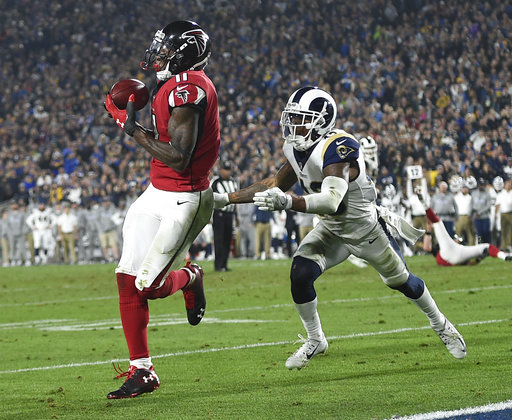 Ryan leads Falcons' 26-13 playoff win over LA Rams