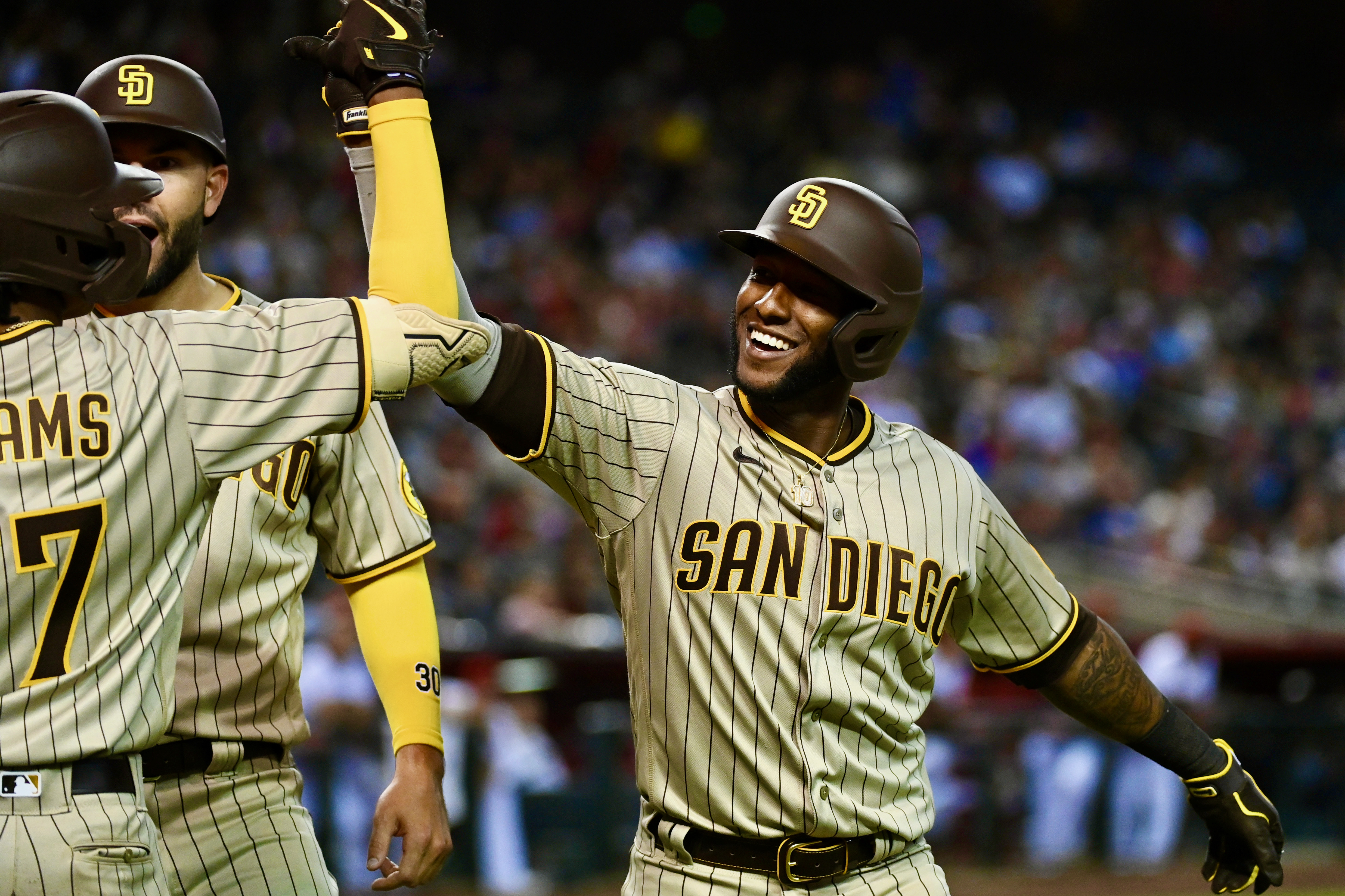 Twin win: Rogers gets save, brother loss as Padres top Giants 4-2