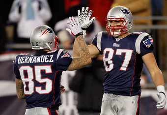 New England Patriots tight end Aaron Hernandez (85) celebrates in the  endzone after scoring on a 10-yard touchdown reception in the fourth  quarter against the Green Bay Packers at Gillette Stadium in Foxboro,  Massachusetts on December 19, 2010. The