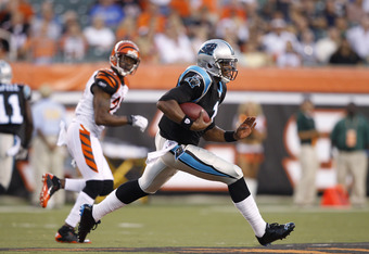 Carolina Panthers quarterback Cam Newton (1) breaks free from