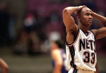 Stephon Marbury of the New Jersey Nets looks on during the game