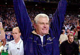 St. Louis Rams head football coach Mike Martz pumps his fist as he