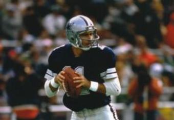 Dallas Cowboys quarterback Danny White looks to handoff during the