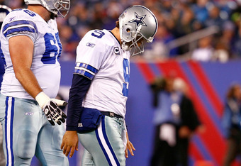 Dallas Cowboys quarterback Tony Romo (9) runs out of the pocket against the  New York Giants in the third quarter in week 1 of the NFL season at MetLife  Stadium in East