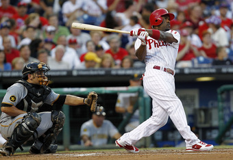 Carlos Ruiz, Brad Lidge, and Jimmy Rollins Framed Print by Jeff Zelevansky  