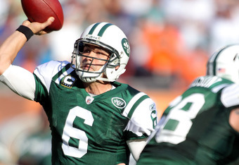 ADVANCE FOR WEEKEND EDITIONS, AUG. 25-26 - FILE - This Aug. 10, 2012 file  photo shows New York Jets quarterbacks Tim Tebow, left, and Sanchez during  warms up prior to an NFL