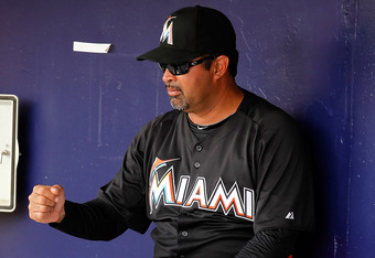 A very embarrassed Ozzie Guillen apologizes for betraying the