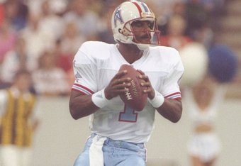 Houston Oilers wide receiver Ernest Givins looks over his shoulder