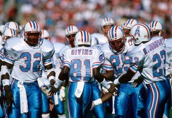 Houston Oilers wide receiver Ernest Givins looks over his shoulder