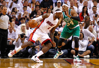 MIAMI, FL - JUNE 05: LeBron James #6 of the Miami Heat drives in the first quarter against Paul Pierce #34 of the Boston Celtics in Game Five of the Eastern Conference Finals in the 2012 NBA Playoffs on June 5, 2012 at American Airlines Arena in Miami, F