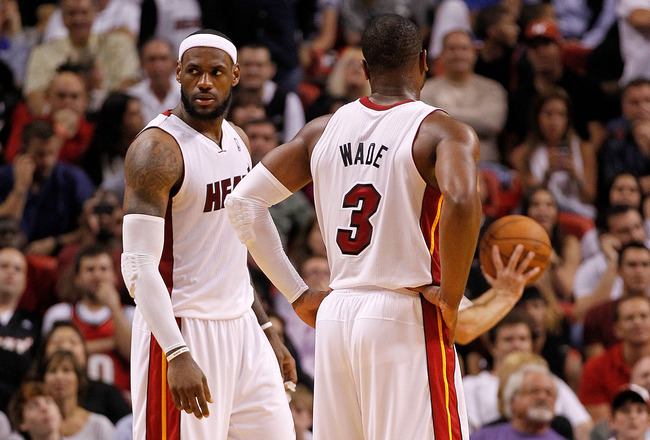 miami, fl - february 21: lebron james #6 and dwyane wade #3 of