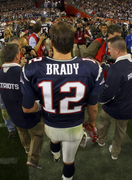 GLENDALE, AZ - FEBRUARY 03:  Tom Brady #12 of the New England Patriots, walks off the field after losing to the New York Giants 17-14 in Super Bowl XLII on February 3, 2008 at the University of Phoenix Stadium in Glendale, Arizona.  (Photo by Donald Miral