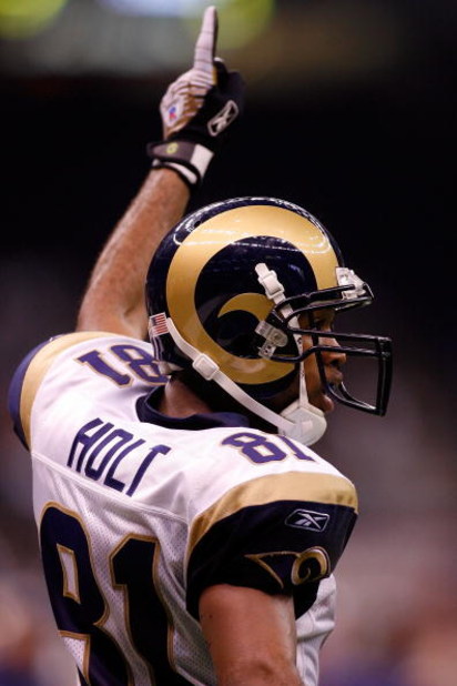 NEW ORLEANS - NOVEMBER 11:  Torry Holt #81 of the St. Louis Rams celebrates after a touchdown by Randy McMichael #84 against the New Orleans Saints on November 11, 2007 at the Louisiana Superdome in New Orleans, Louisiana. The Rams defeated the Saints 37-