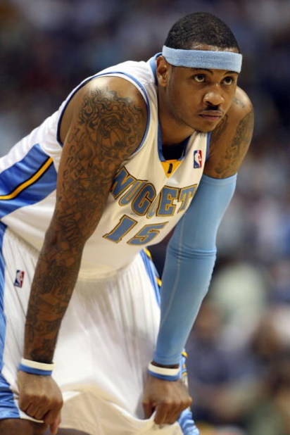 DENVER - MAY 29:  Carmelo Anthony #15 of the Denver Nuggets looks on in Game Six of the Western Conference Finals during the 2009 NBA Playoffs against the Los Angeles Lakers at Pepsi Center on May 29, 2009 in Denver, Colorado. NOTE TO USER: User expressly