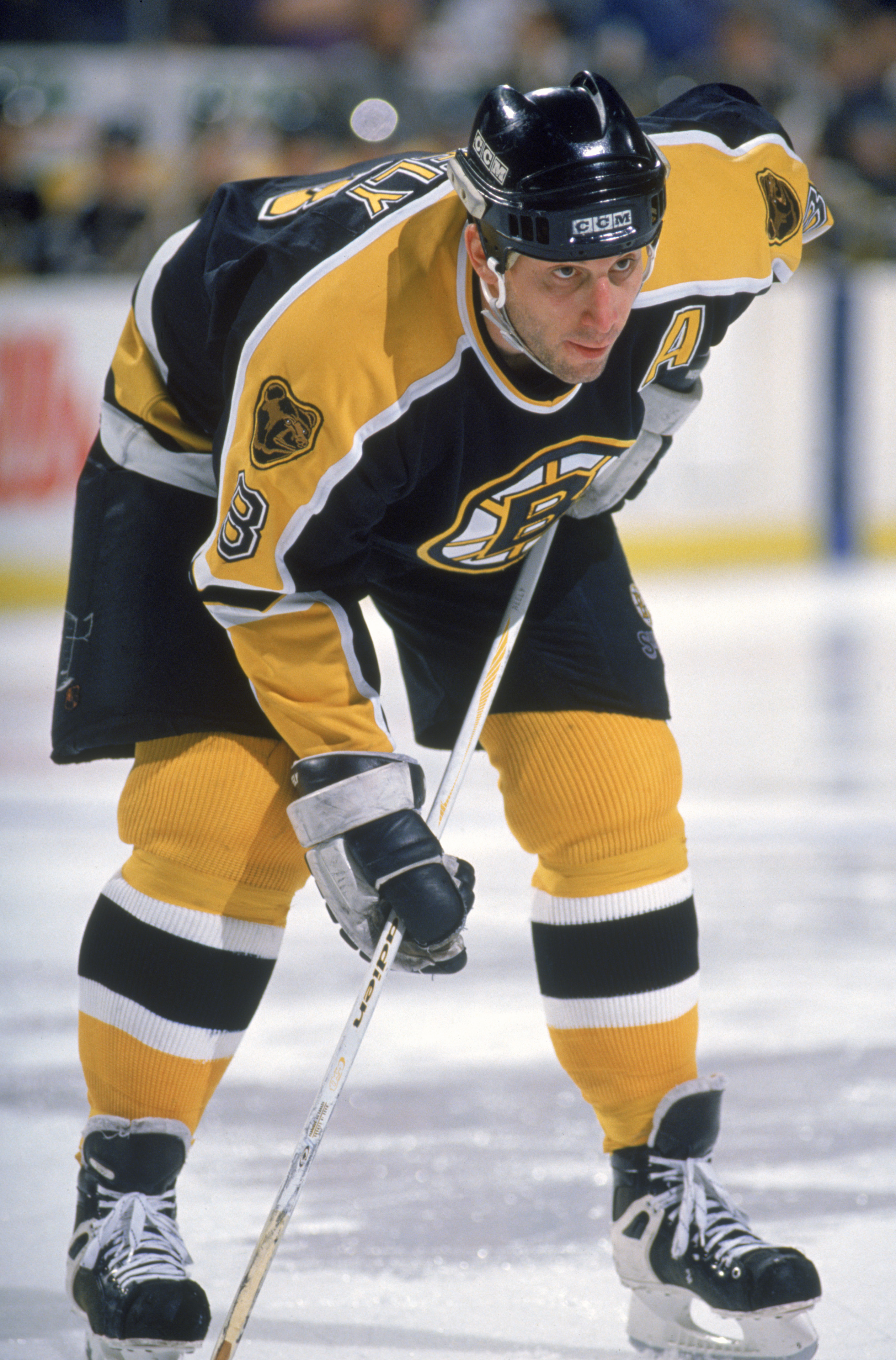 BUFFALO, NY - FEBRUARY 7:  Cam Neely #8 of the Boston Bruins lines up for the faceoff against the Buffalo Sabres at Memorial Auditorium on February 7, 1996 in Buffalo, New York. The Bruins defeated the Sabres 3-2. (Photo by Rick Stewart/Getty Images)