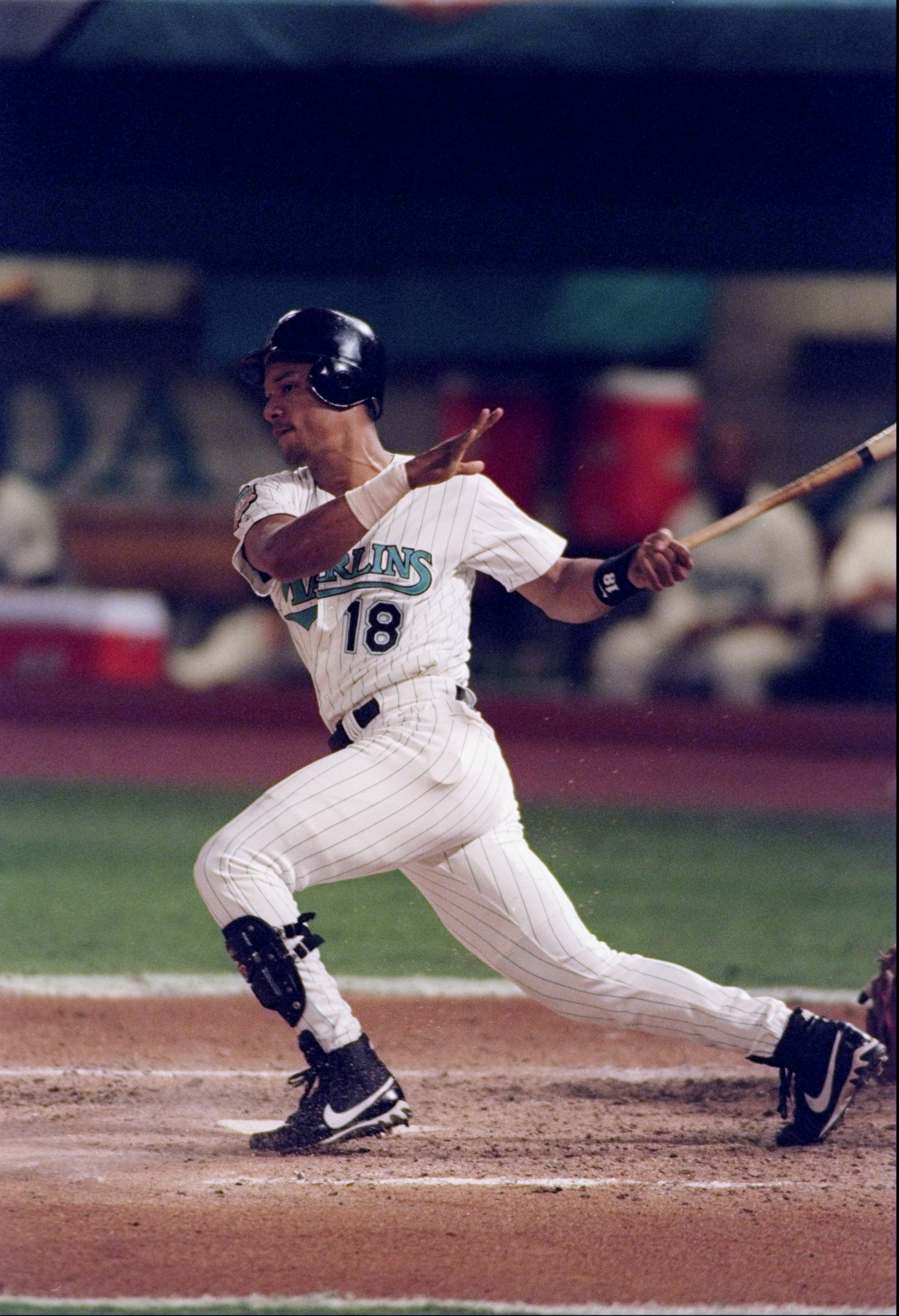 18 Oct 1997: Outfielder Moises Alou of the Florida Marlins swings at the ball during game one of the World Series against the Cleveland Indians at Pro Player Park in Miami, Florida. The Marlins won the game 7-4.