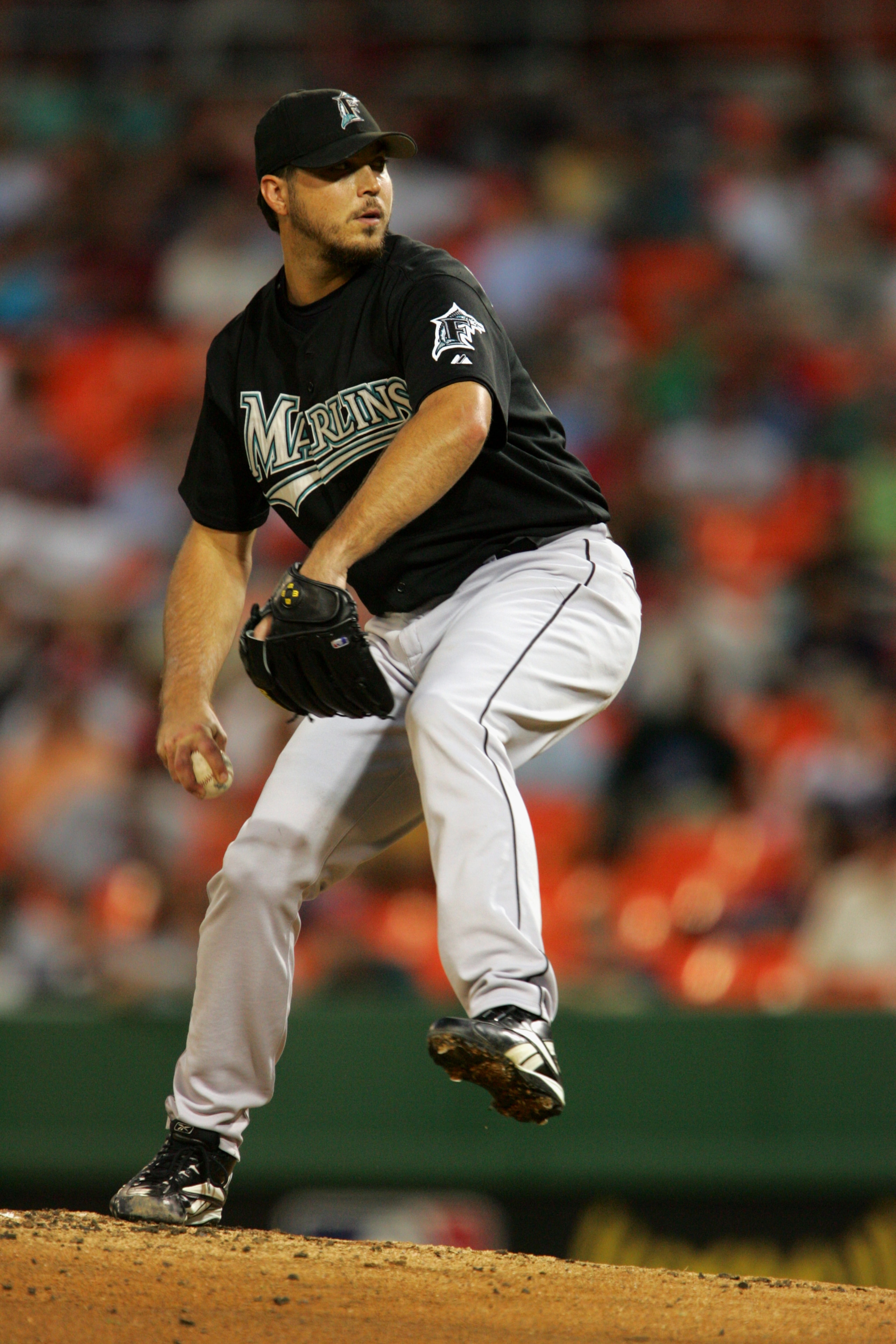 WASHINGTON - SEPTEMBER 8:  Pitcher Josh Beckett #21 of the Florida Marlins delivers a pitch against the Washington Nationals during the game on September 8, 2005 at RFK Stadium in Washington, DC.  The Marlins won 8-4.  (Photo by Jamie Squire/Getty Images)