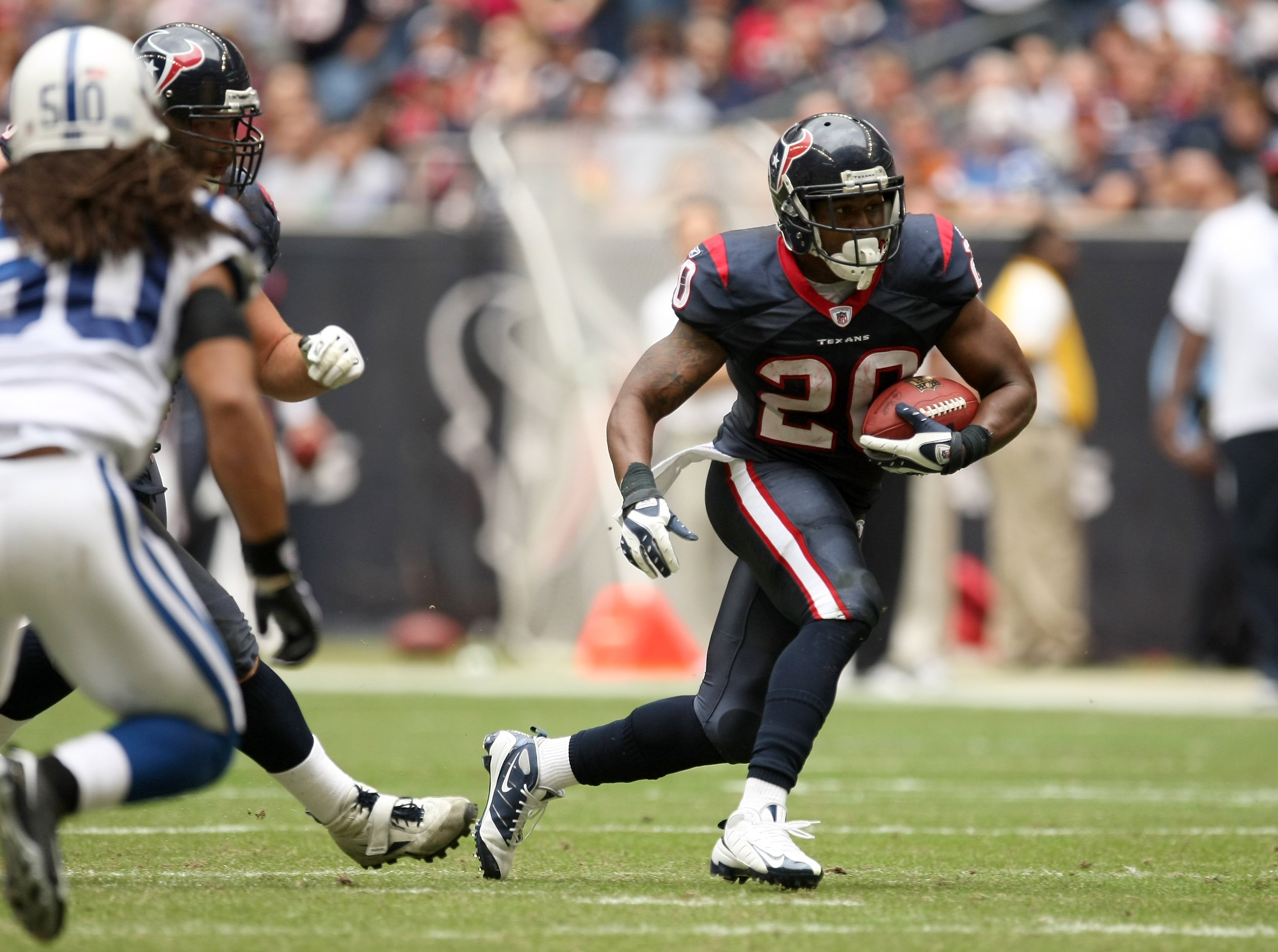 Steven Jackson of the St. Louis Rams is tackled by Aaron Schobel of News  Photo - Getty Images