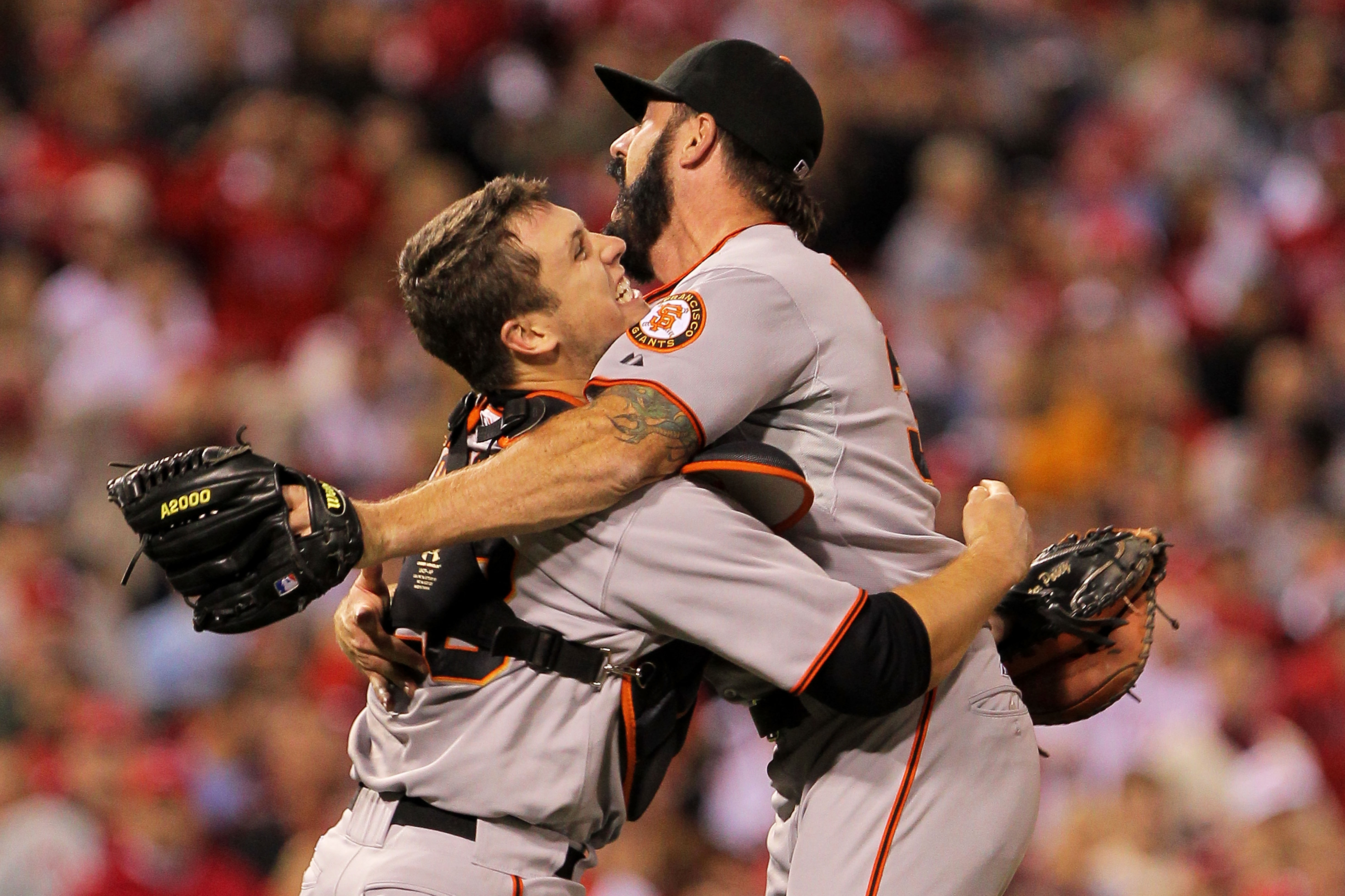 PHILADELPHIA - OCTOBER 23:  Buster Posey #28 and Brian Wilson #38 of the San Francisco Giants celebrate defeating the Philadelphia Phillies 3-2 and winning the pennant in Game Six of the NLCS during the 2010 MLB Playoffs at Citizens Bank Park on October 2