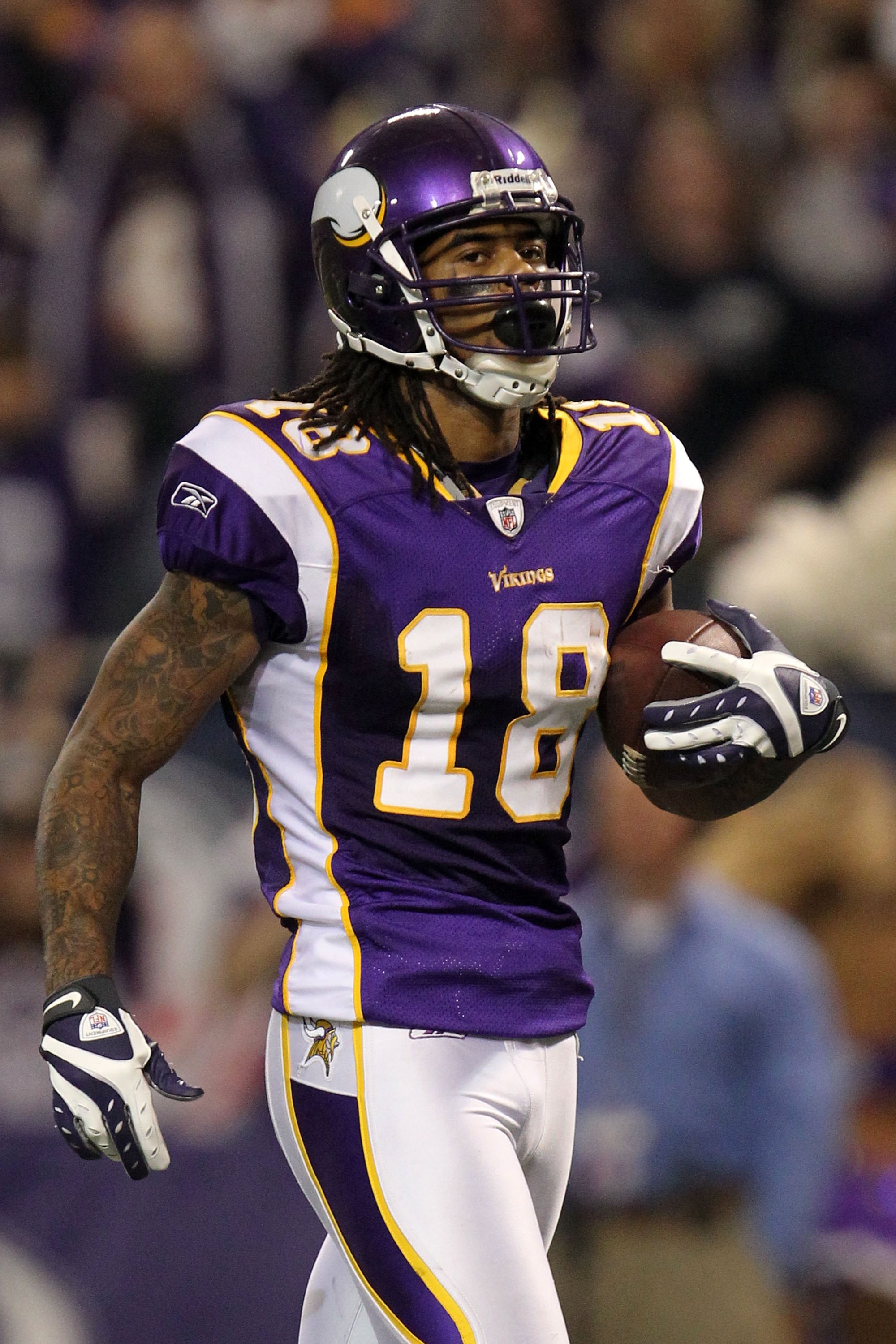 MINNEAPOLIS - JANUARY 17:  Wide receiver Sidney Rice #18 of the Minnesota Vikings looks on after scoring a touchdown against the Dallas Cowboys during the NFC Divisional Playoff Game at Hubert H. Humphrey Metrodome on January 17, 2010 in Minneapolis, Minn