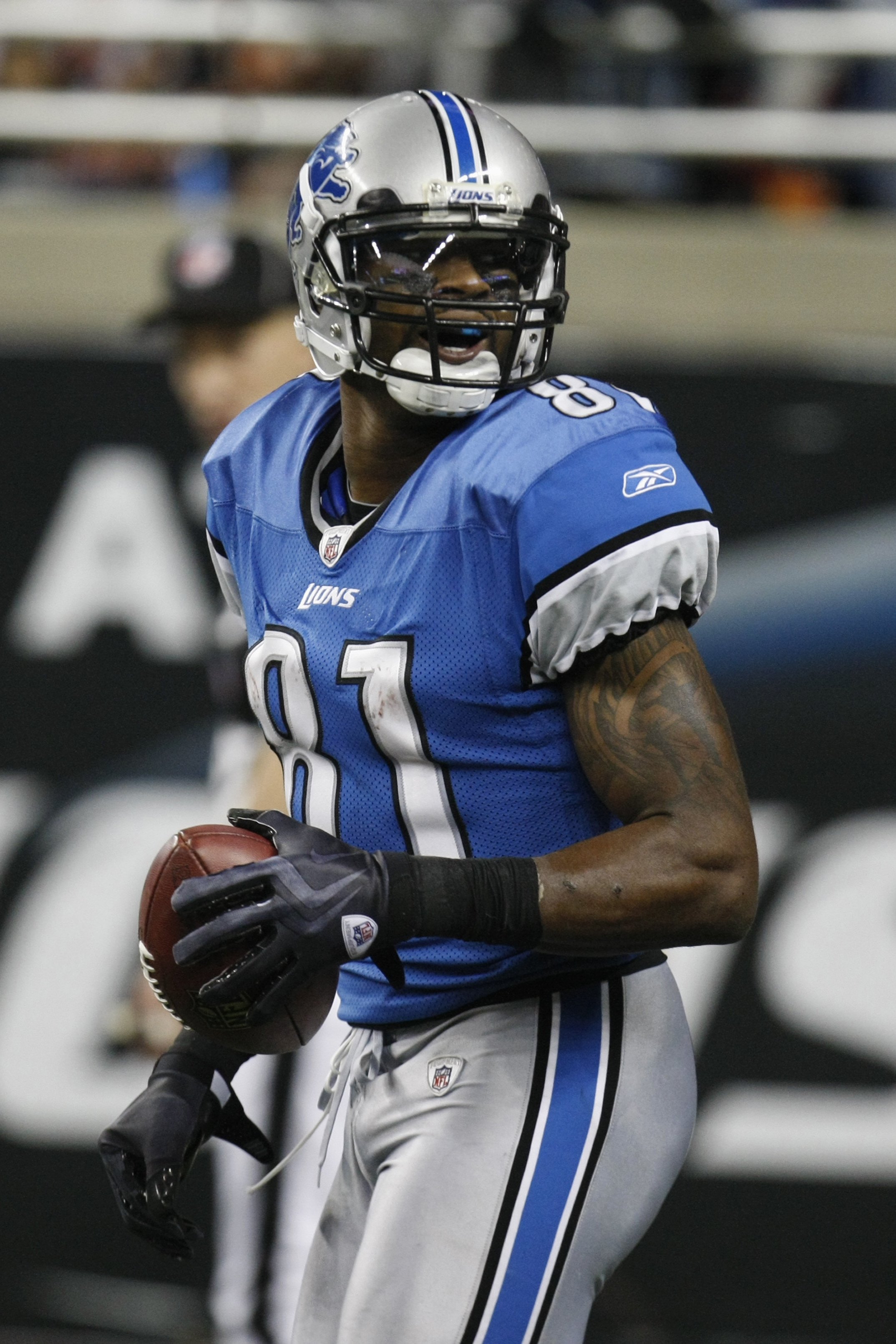 DETROIT - JANUARY 3:  Calvin Johnson #81 of the Detroit Lions looks on during the game against the Chicago Bears on January 3, 2010 at Ford Field in Detroit, Michigan. (Photo by Gregory Shamus/Getty Images)