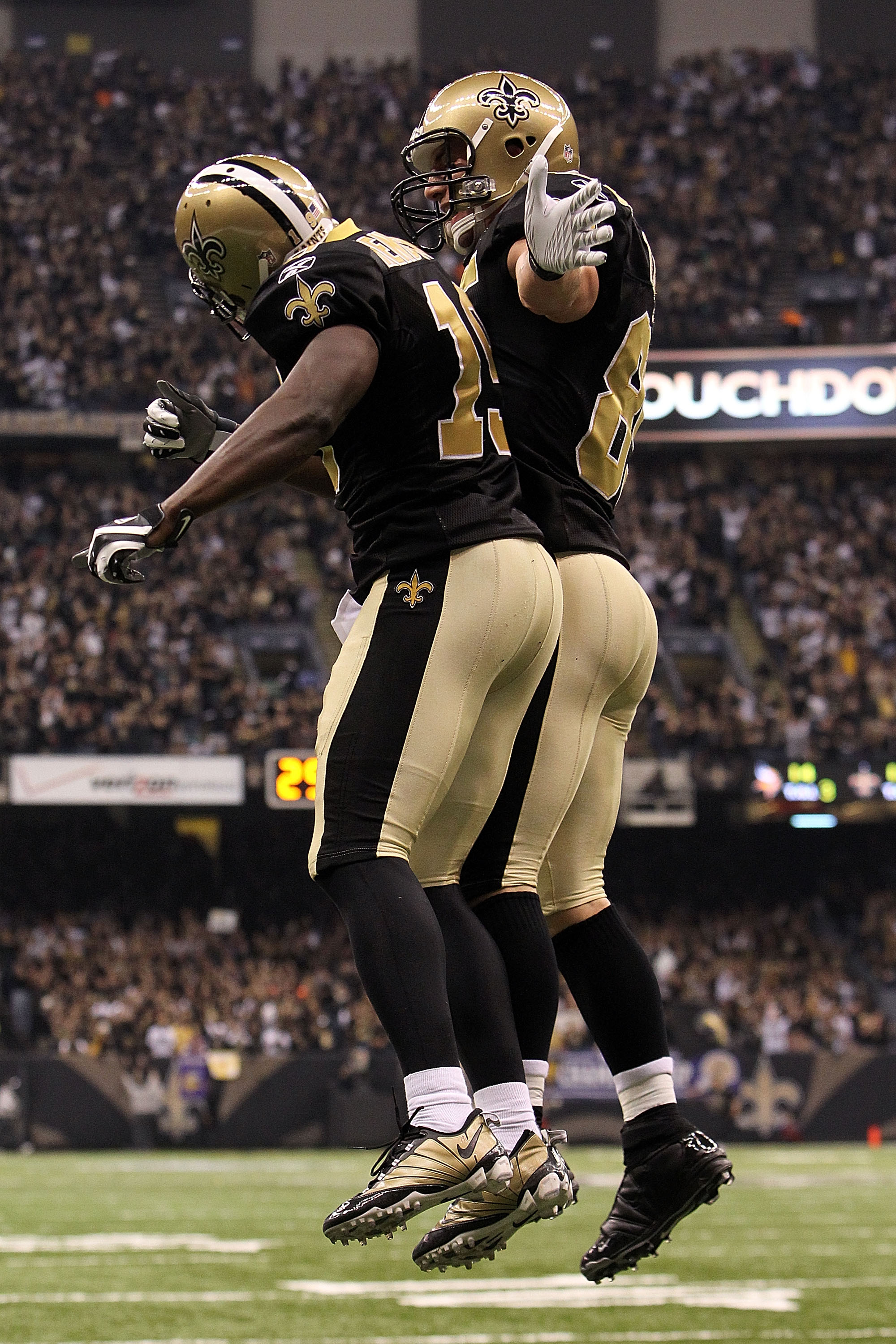 NEW ORLEANS - JANUARY 24:  Devery Henderson #19 of the New Orleans Saints celebrates after scoring a touchdown in the second quarter with teammate David Thomas #85 against the Minnesota Vikings during the NFC Championship Game at the Louisana Superdome on