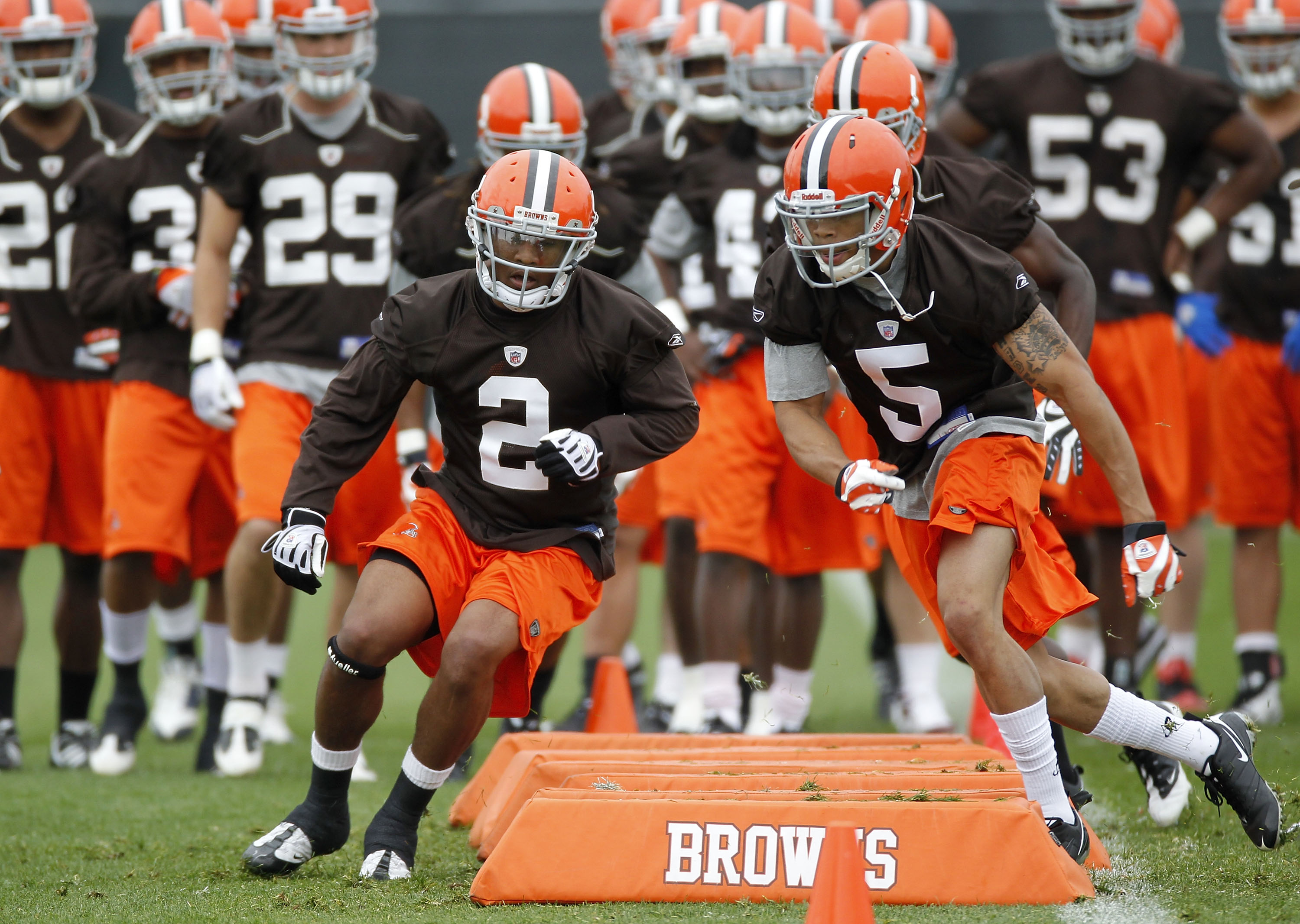BEREA, OH - MAY 01:  T.J. Ward #2 and Joe Haden #5 of the Cleveland Browns run through a drill during rookie mini camp at the Cleveland Browns Training and Administrative Complex on May 1, 2010 in Berea, Ohio.  (Photo by Gregory Shamus/Getty Images)