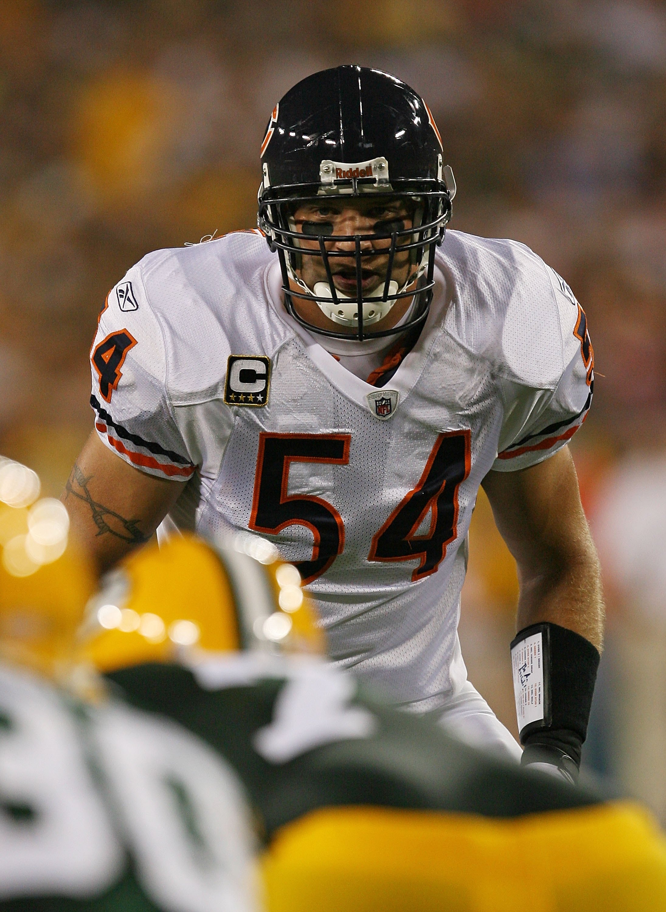 Chicago Bears' linebacker Brian Urlacher (54) attempts to sack Carolina  Panthers' quarterback Jake Delhomme (17) in the third quarter of their NFC  divisional playoff football game in Chicago in 20 …