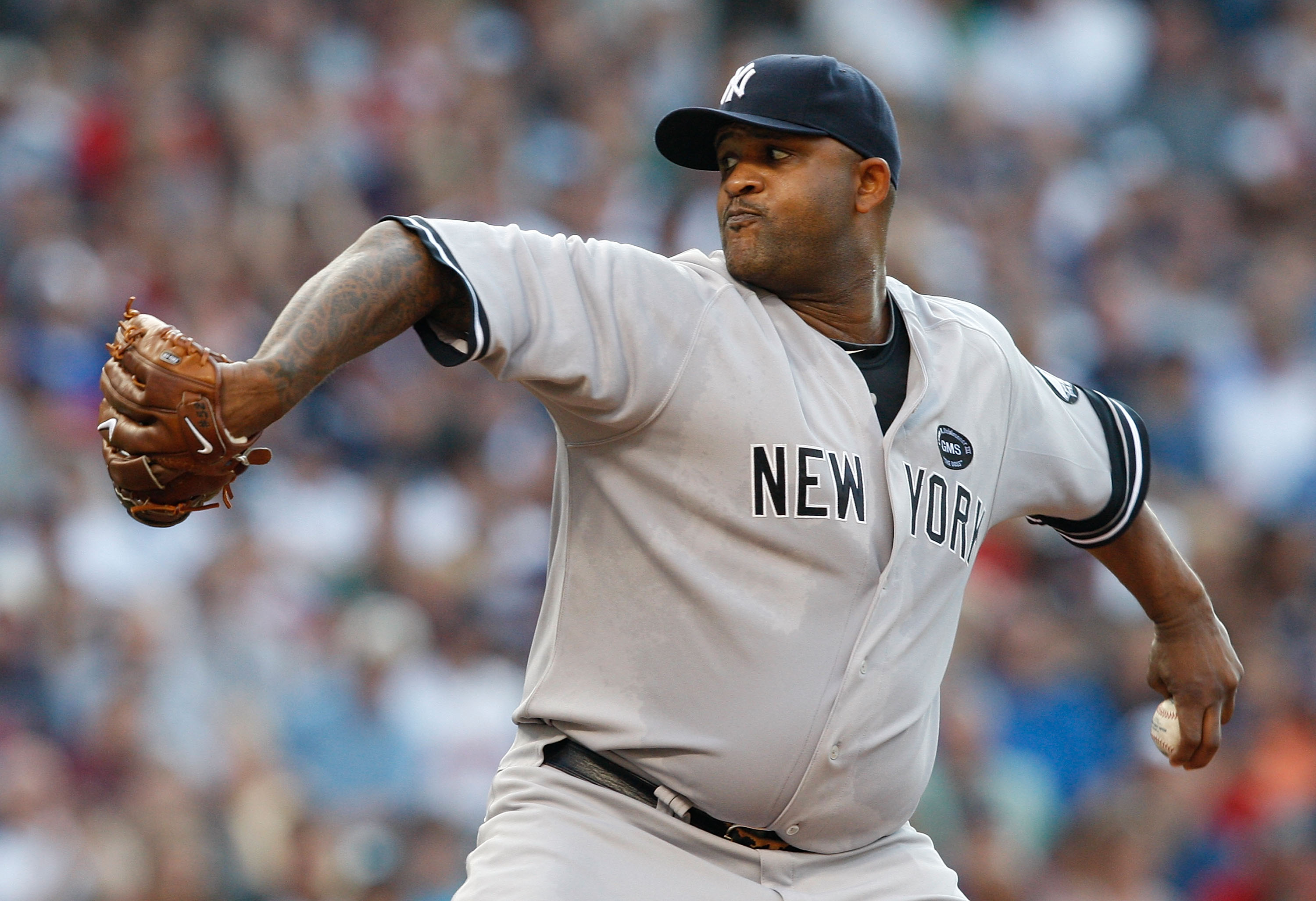 CLEVELAND - JULY 27:  CC Sabathia #52 of the New York Yankees pitches against the Cleveland Indians during the game on July 27, 2010 at Progressive Field in Cleveland, Ohio.  (Photo by Jared Wickerham/Getty Images)