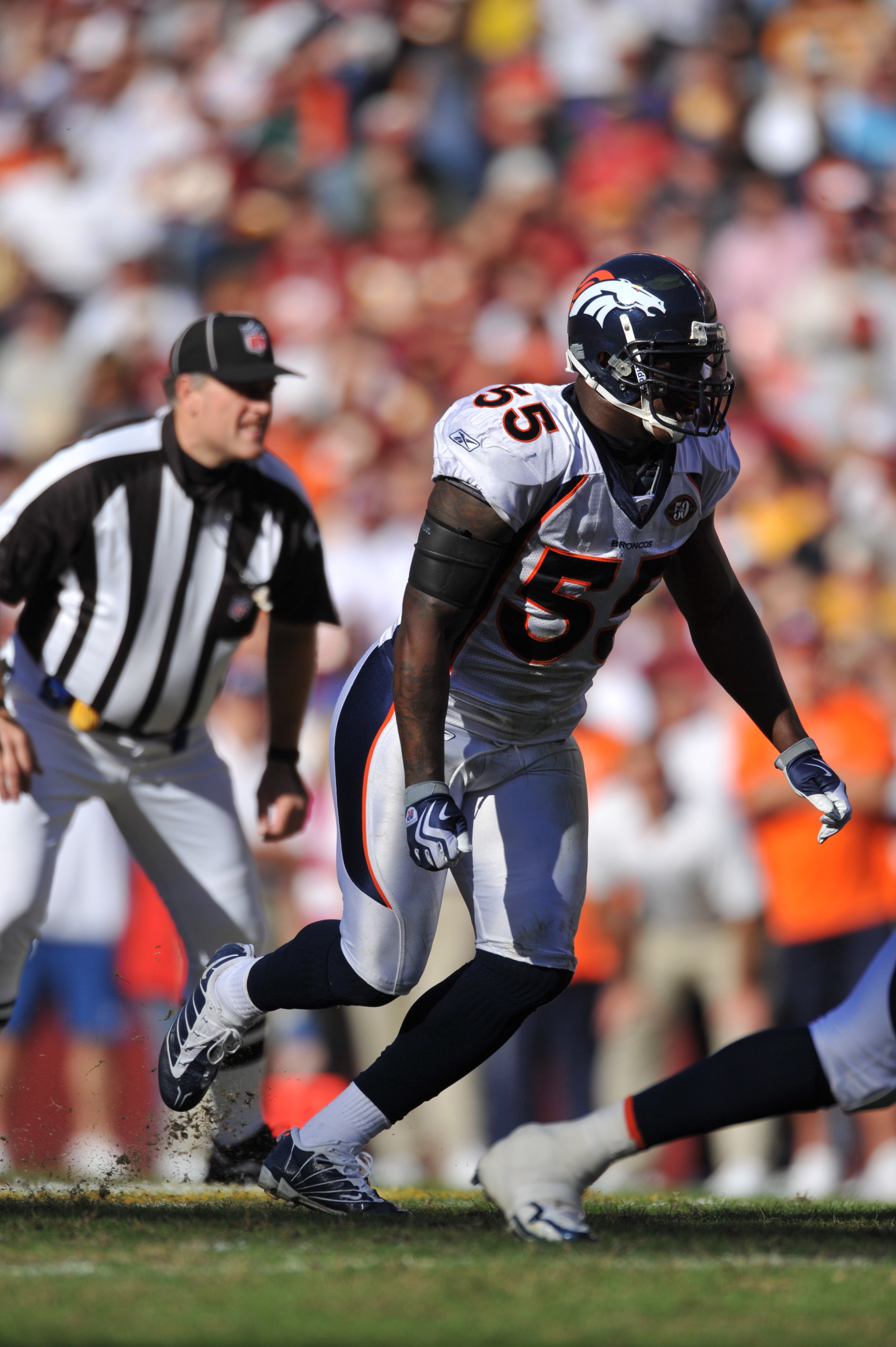 Broncos forced to cut Elvis Dumervil after contract gaffe