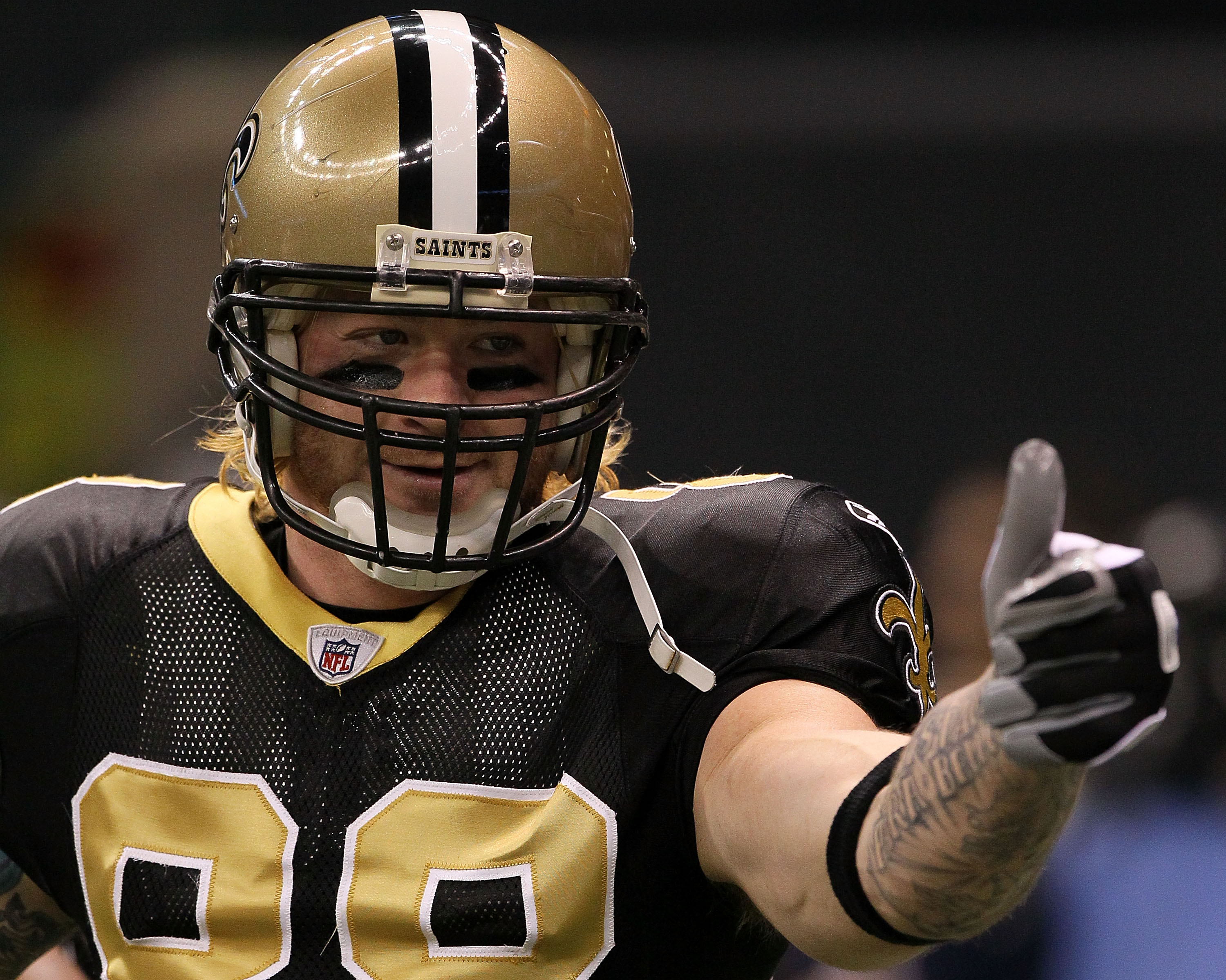 Jeremy Shockey of the New Orleans Saints walks to the sidelines in a