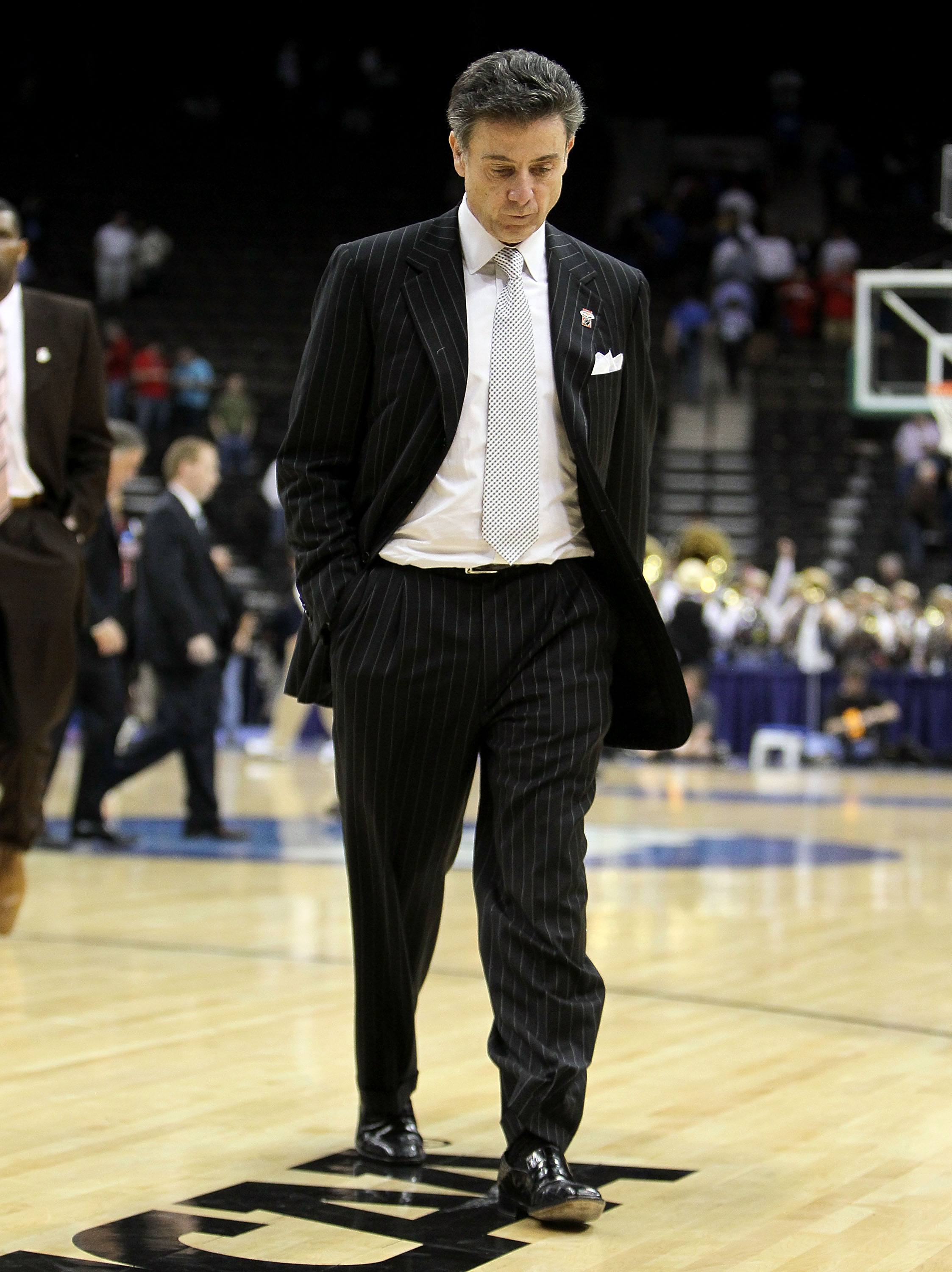 JACKSONVILLE, FL - MARCH 19: Rick Pitino the Head Coach of the Louisville Cardinals walks off of the court following the game against the California Golden Bears during the first round of the 2010 NCAA men's basketball tournament at Jacksonville Veteran's