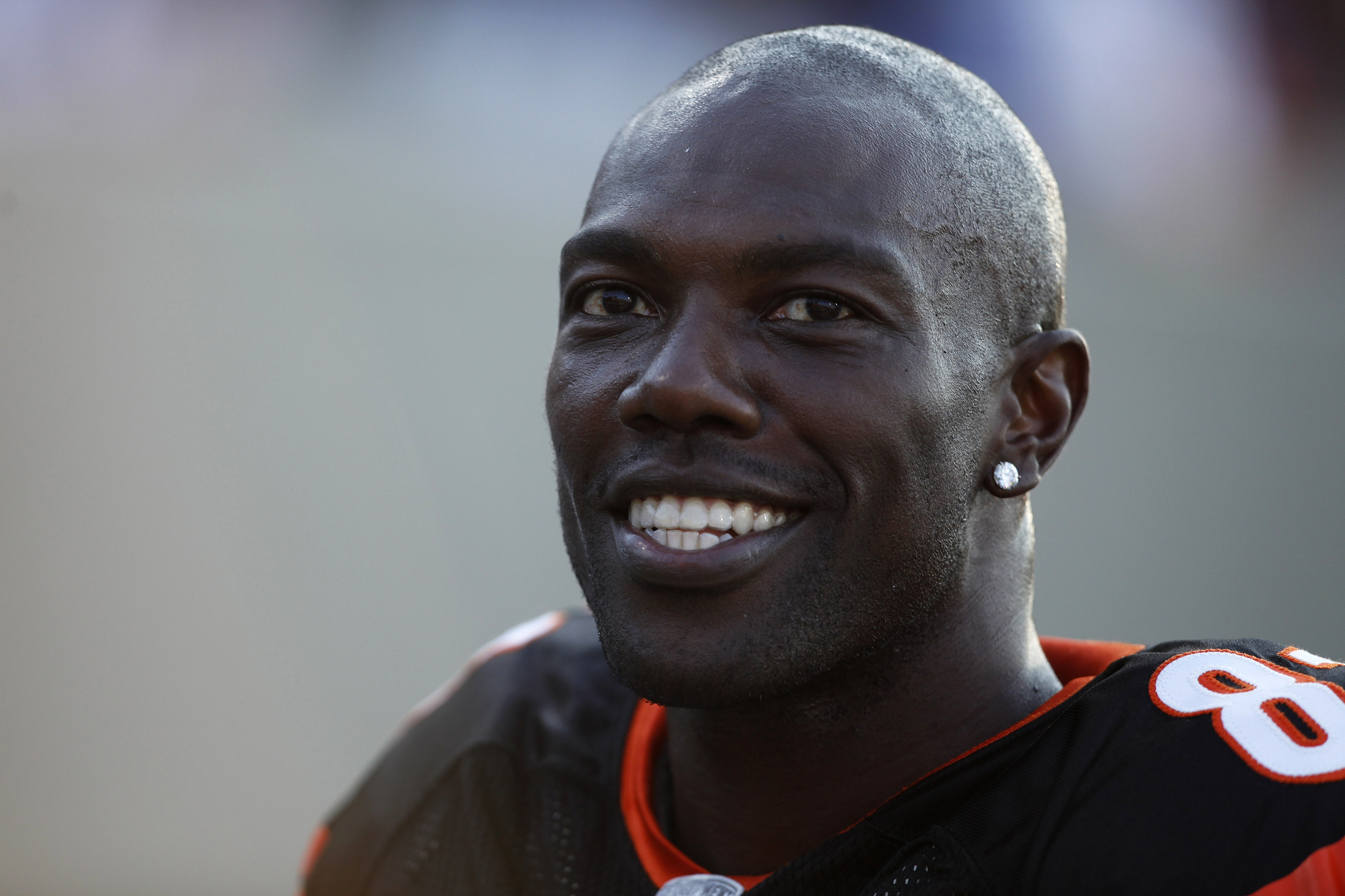 Humbled, Ochocinco now smiles