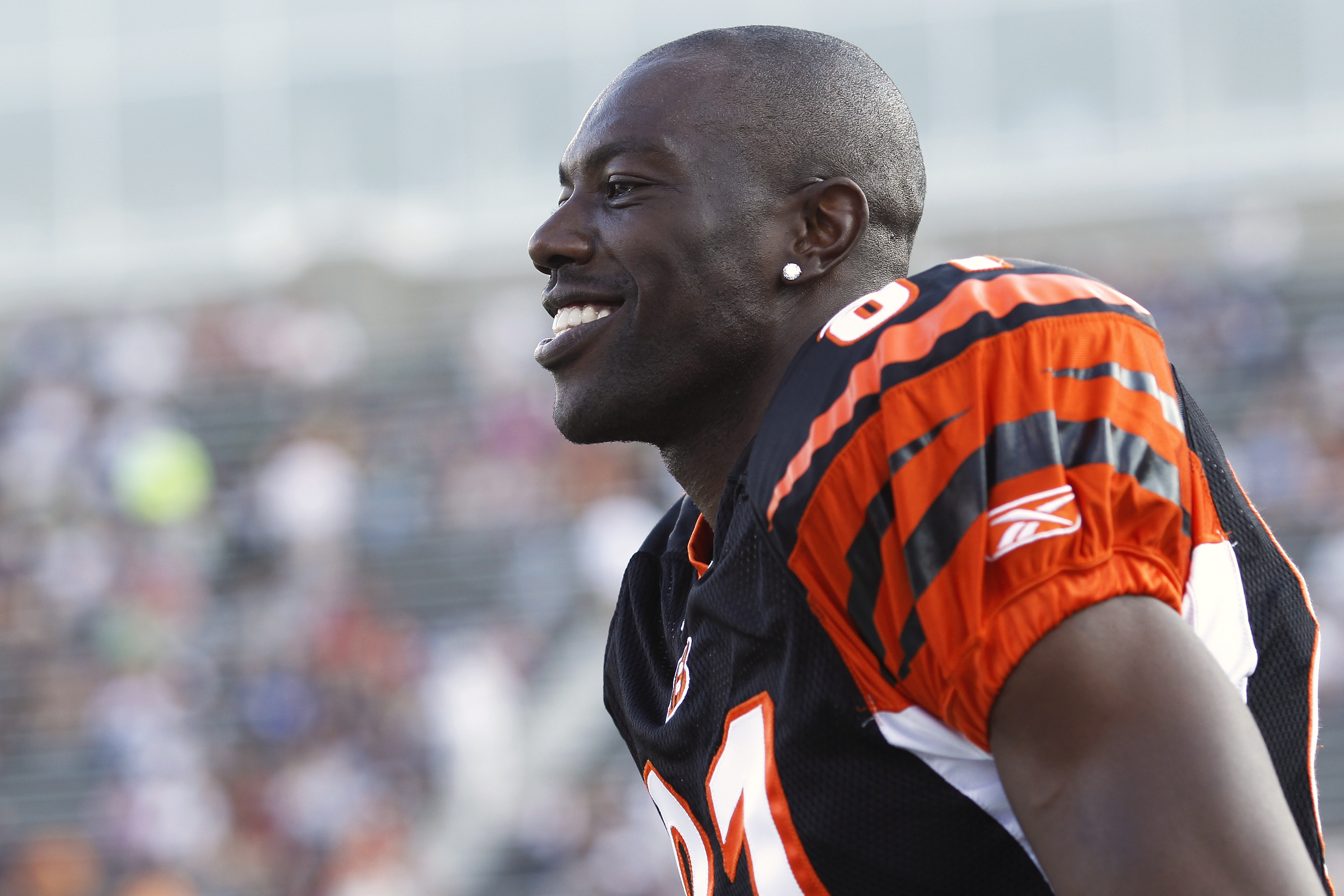 You look happy now, T.O., but just wait until you drop 10 passes and blame it on Carson Palmer