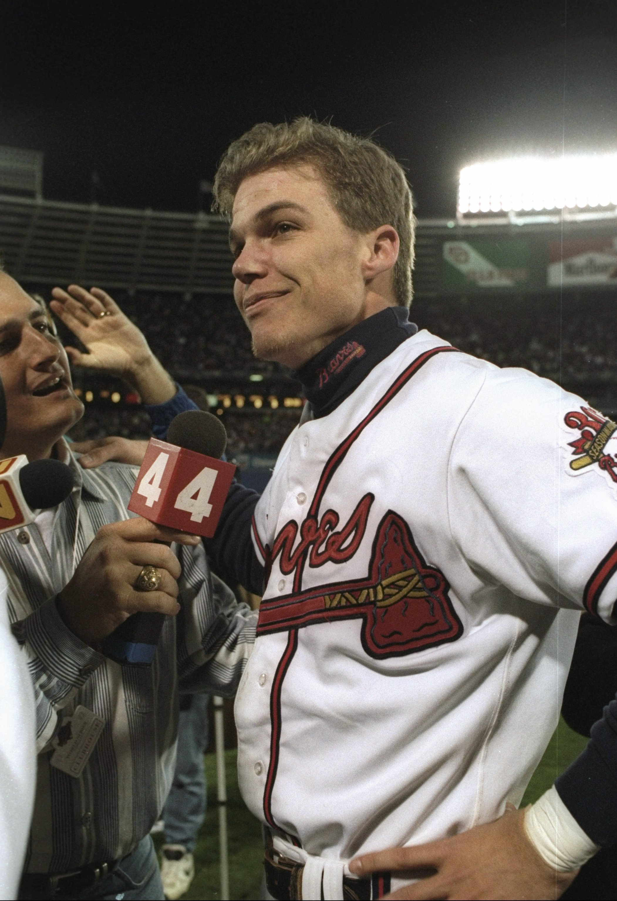 28 Oct 1995:  Third basemen Chipper Jones of the Atlanta Braves speaks with newsperson after winning game six of the World Series against the Cleveland Indians at Fulton County Stadium in Atlanta, Georgia.  The Braves won the game 1 - 0. Mandatory Credit: