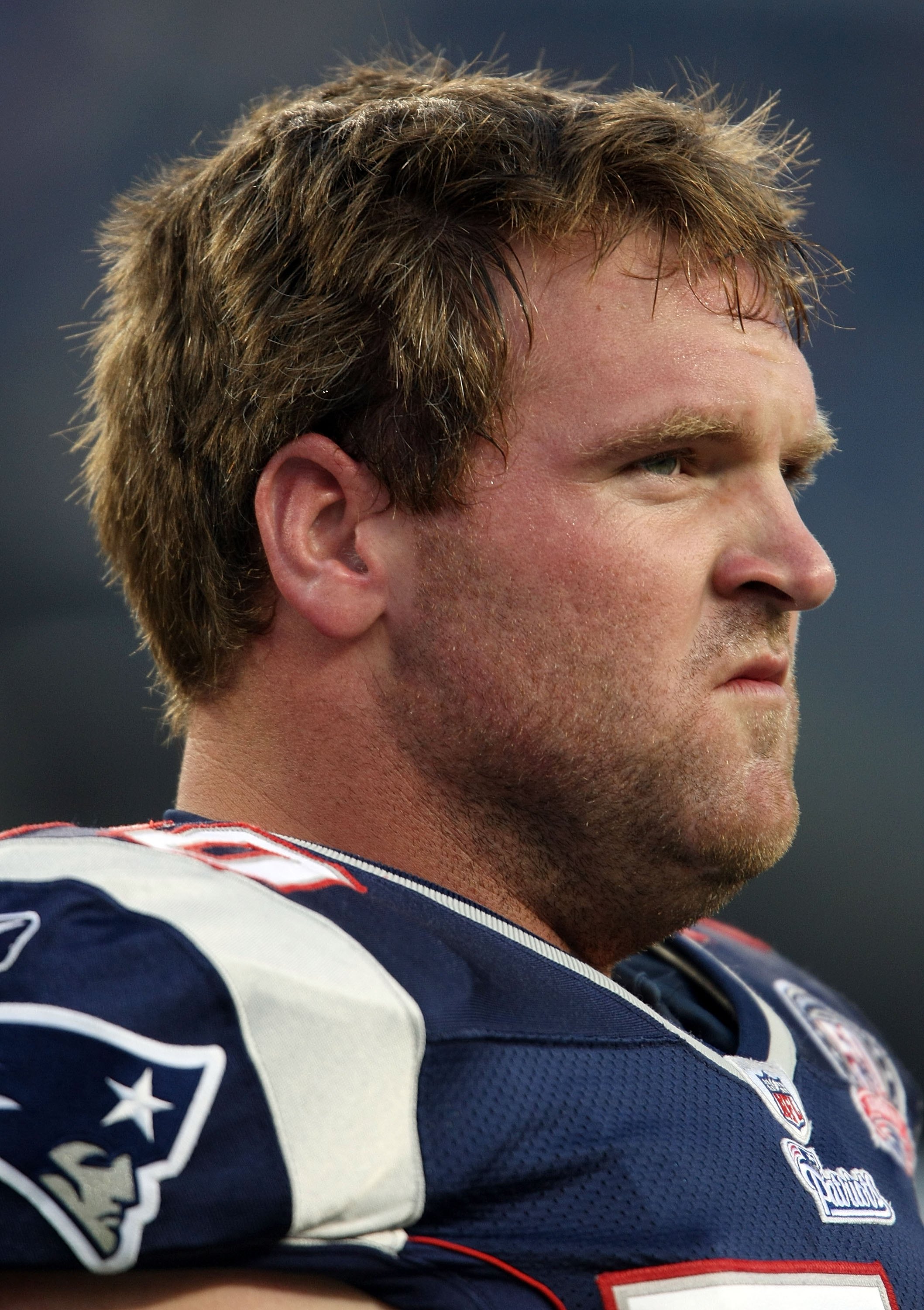 FOXBORO, MA - SEPTEMBER 03:  Logan Mankins #70 of the New England Patriots looks on before the game against the New York Giants on September 3, 2009 at Gillette Stadium in Foxboro, Massachusetts.  (Photo by Elsa/Getty Images)