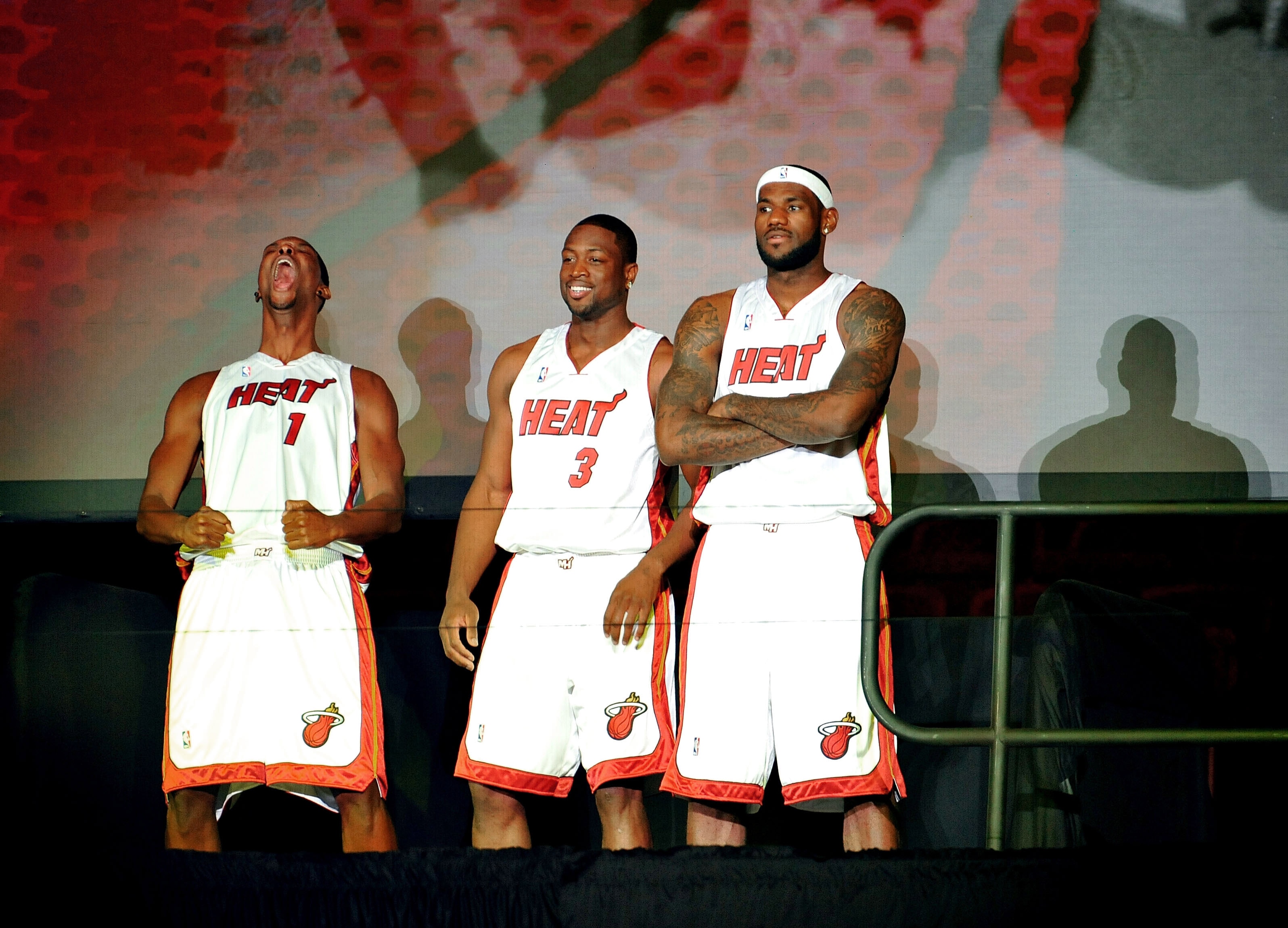 MIAMI - JULY 09: Chris Bosh #1, Dwyane Wade #3, and LeBron James #6 of the Miami Heat are introduced to fans during a welcome party at American Airlines Arena on July 9, 2010 in Miami, Florida. (Photo by Doug Benc/Getty Images)