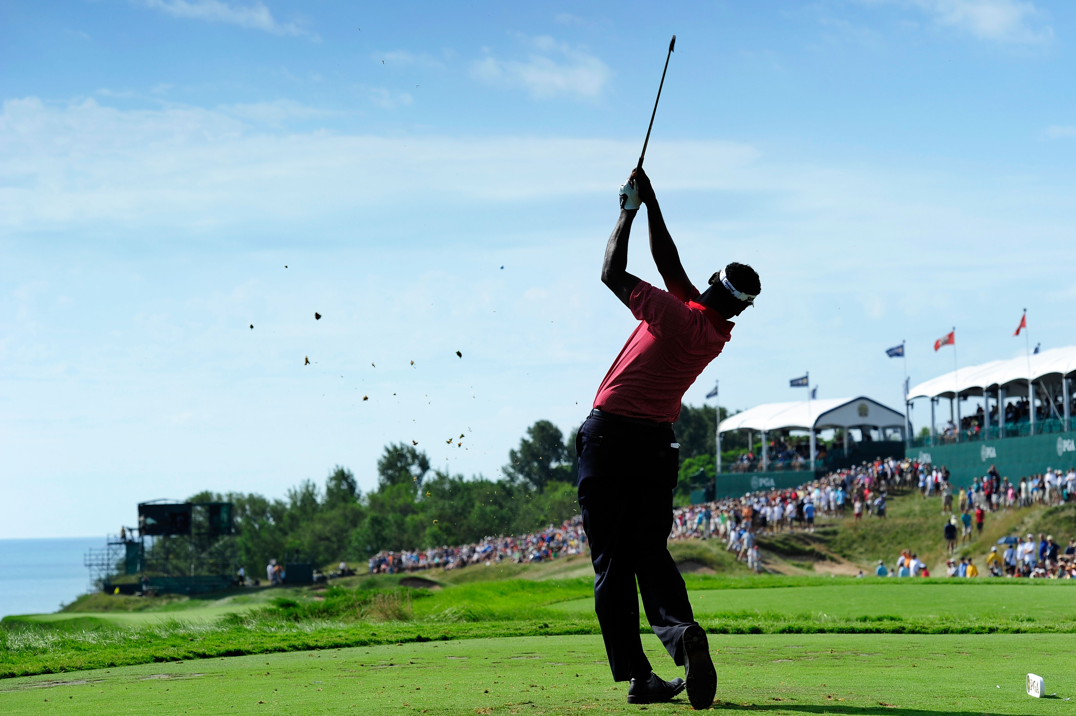 KOHLER, WI - AUGUST 14:  Vijay Singh of Fiji watches his tee shot on the 17th hole during the continuation of the second round of the 92nd PGA Championship on the Straits Course at Whistling Straits on August 14, 2010 in Kohler, Wisconsin.  (Photo by Stua